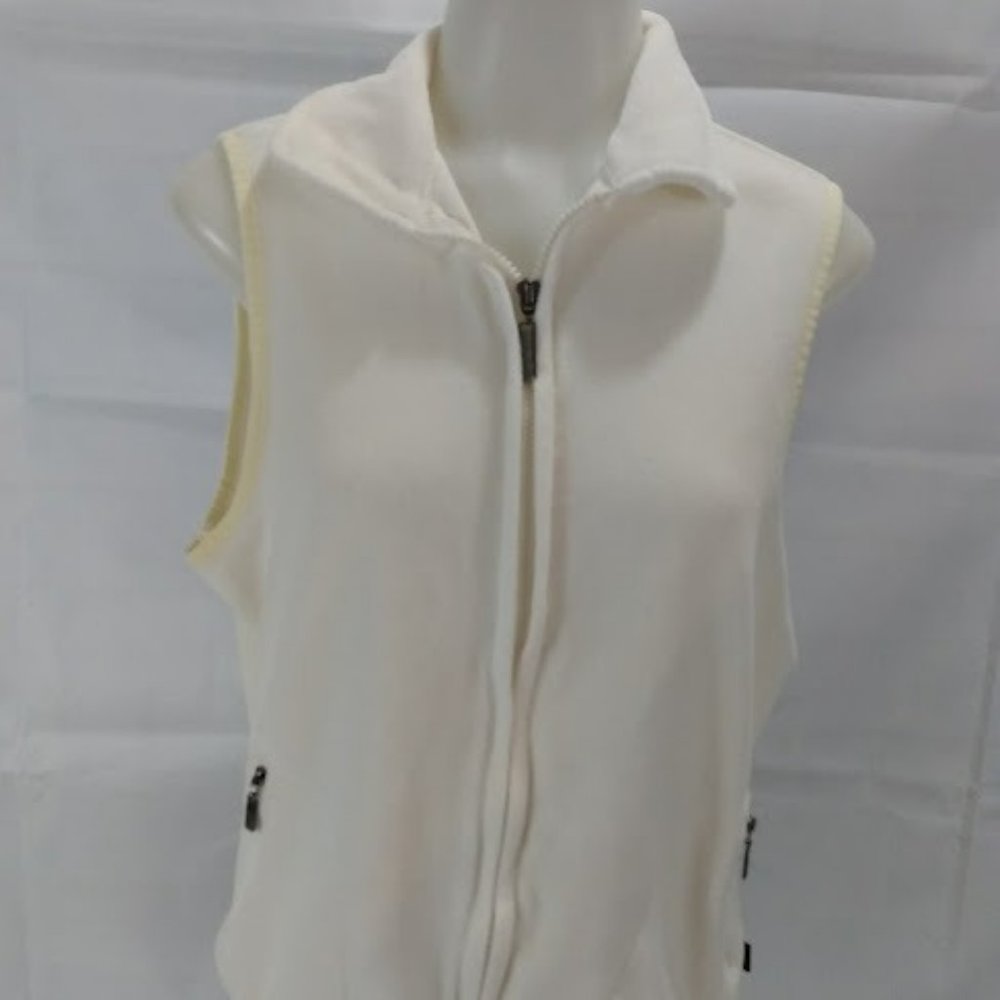 Danskin Now: Woman's cream color vest.